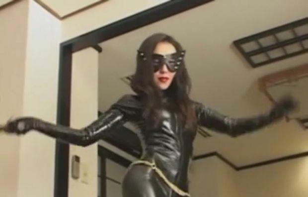 Lovely leather babe in mask