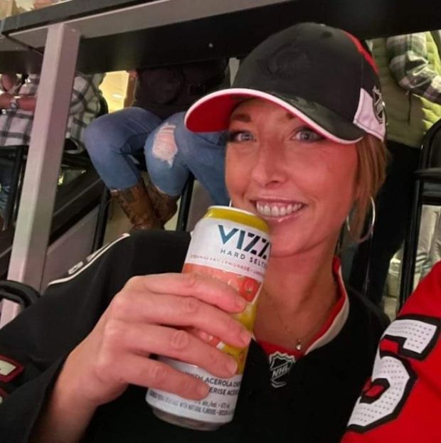 Pam beautiful smile with a beer