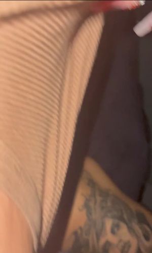 Sexy brunette plays with her pussy