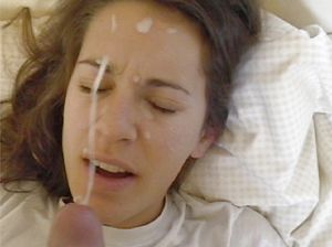 Action-shot of an amateur brunette taking a facial