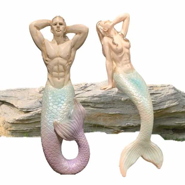 sexy mermaid and sexy merman sculpture