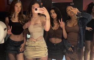 MacKenzie and friends bathroom selfie all dressed up