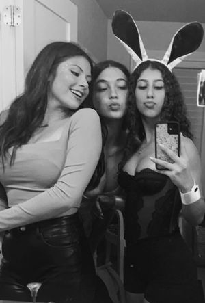 Three teens bunny mirror selfie