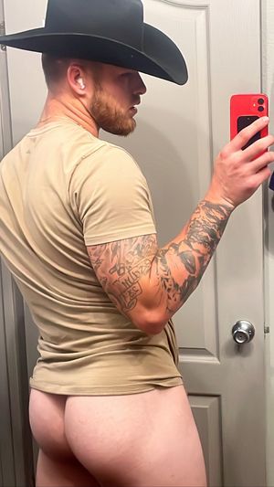 Muscle butt with cowboy hat