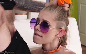 Hitting her nose with it