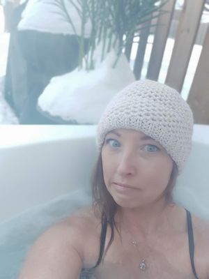 Pam in touque in hot tub