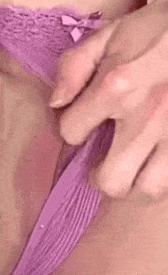 A gleam in her eyes, the beginning of a smile, the teeth on her lower lip, she seems to love it