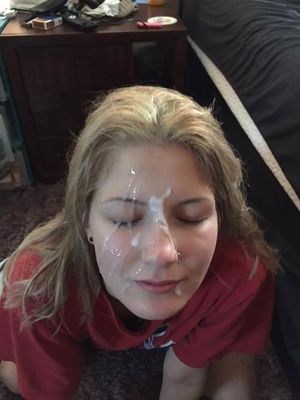 Blond amateur with cum all over her face