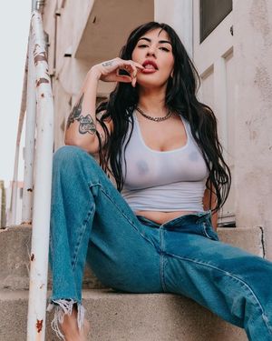 Stunning seductive brunette seethru top