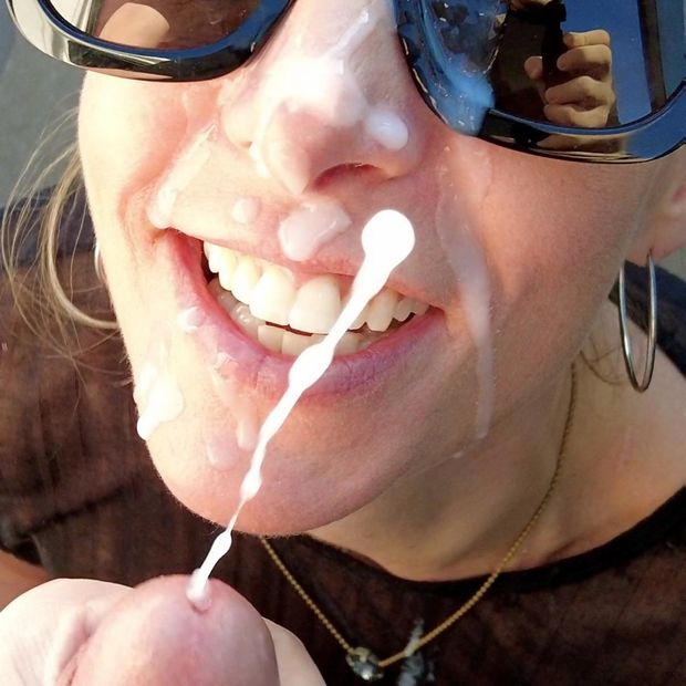 Amateur blond MILF taking an action-shot facial and loving it