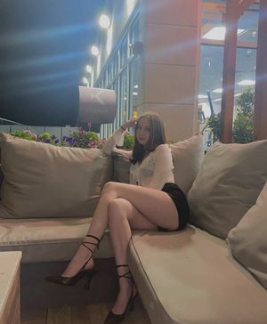 Sexy brunette with amazing long legs
