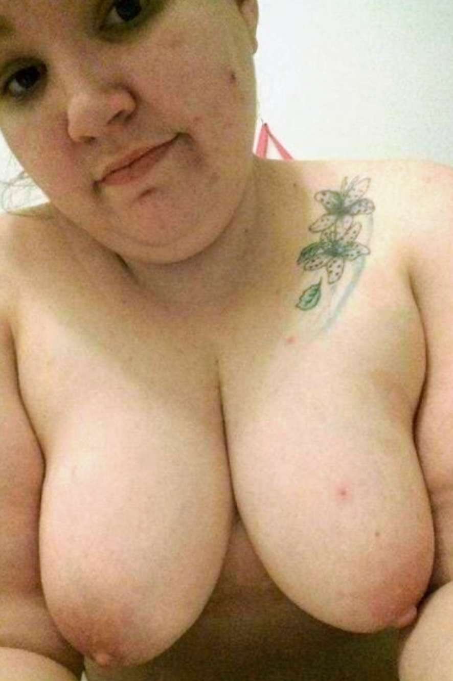 Bent over squeezing them perfect tits together for us