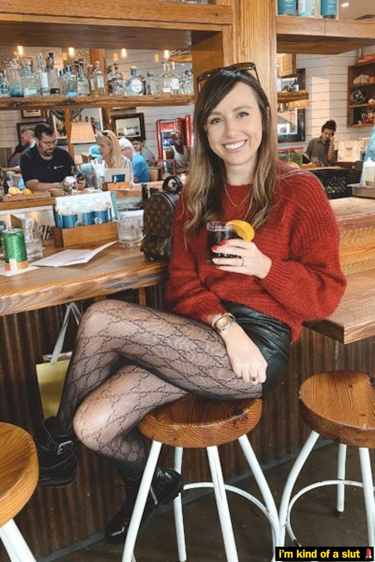 Smiling slutwife stops in for a drink after work.