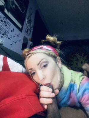 Amateur brunette sucking on some black dick