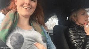 Sexy redhead with a milky shirt