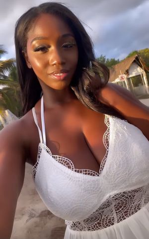 Ellie Mae white dress selfie