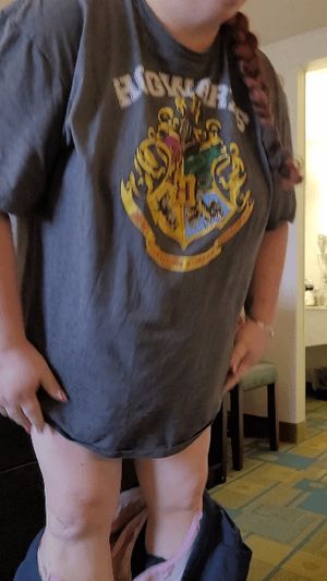 BBW getting undressed in hotel room