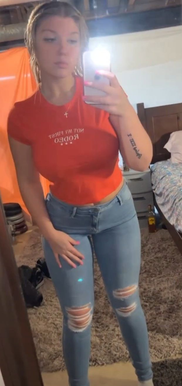 Destiny orange top selfie