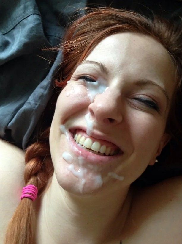 Happy amateur redhead smiling with her facial