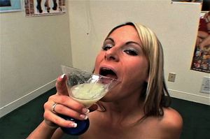 My mom drinking a full glass of cum after a gang bang!