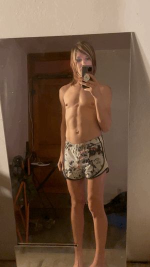 Small cock sissy wearing swimsuit shorts