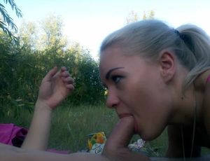 Amateur blond having a picnic and sucking dick