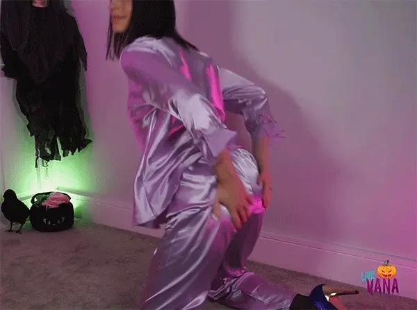 Vana rubbing her satin covered ass