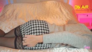 Vana hitching up her skirt. Showing her satin panties