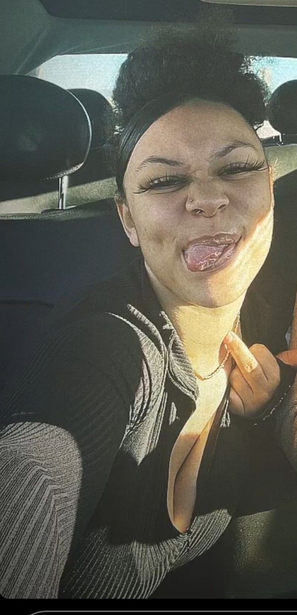 Her middle finger means an open invitation.