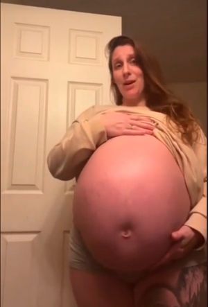 Huge Pregnant Belly - They're kicking...Wanna touch it and feel it?
