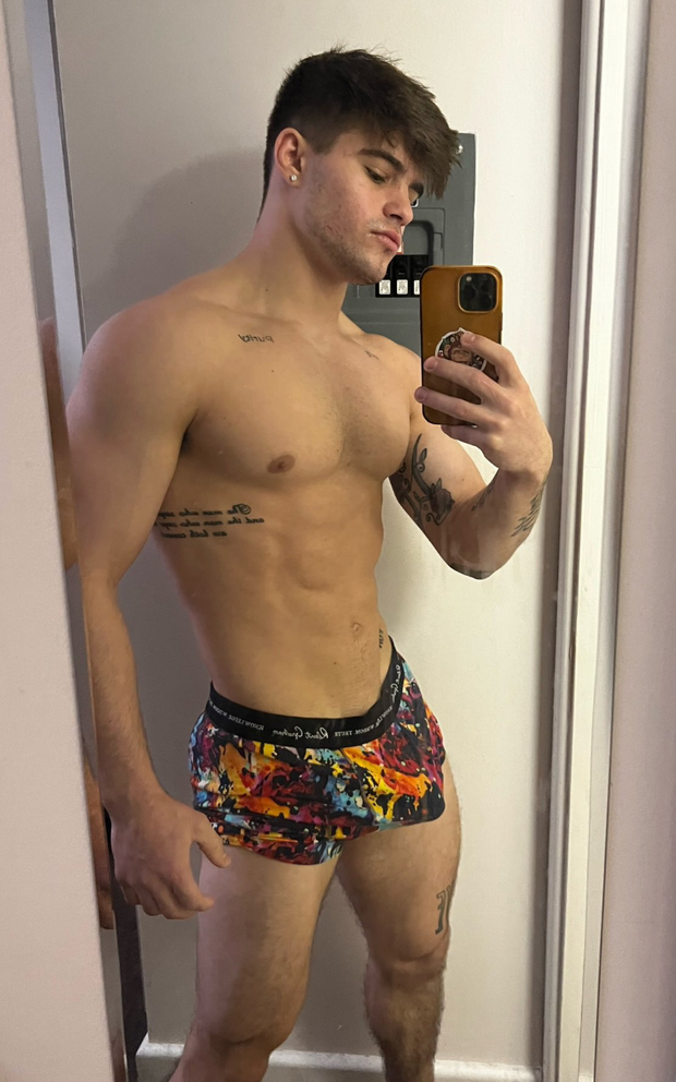 Bulge in his short boxers