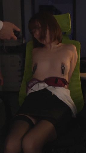 Hands tied, unable to shake off the vibrators clamped on her sensitive nipples