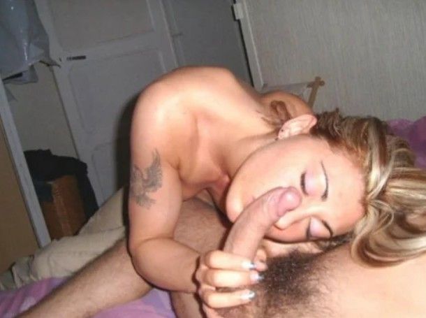 Pretty amateur brunette giving head to a curved cock