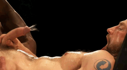 giving himself a mouth facial