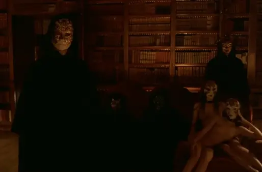 Two hedonistic beauties are feeding their eyes with the view of the orgy while a cloaked gentleman enters the room - Eyes Wide Shut Orgy