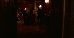 Entering the room where the audience is watching a servant used as a table for a couple having a fiery fun - Eyes Wide Shut Orgy