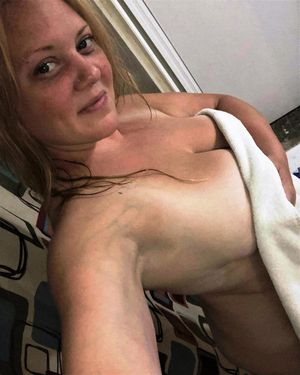 Juliana just out of the shower after getting freshly knotted and seeded by Fang! her favorite dog!