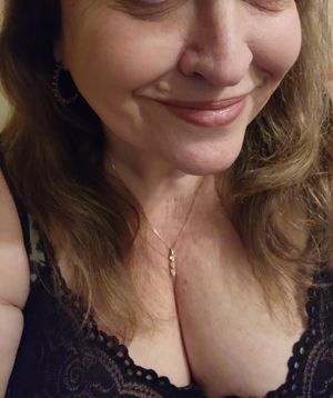Curvy MILF with beautiful smile and chubby boobs....