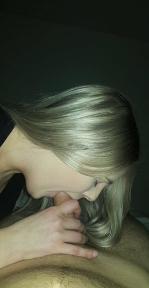 Amateur blond giving a blowjob