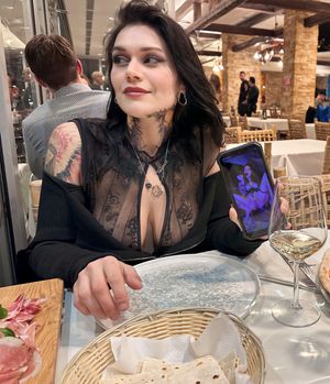 Tattooed babe reminiscing