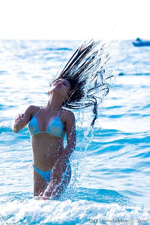 Beautiful ladyboy Amy poses in skimpy bikini #10