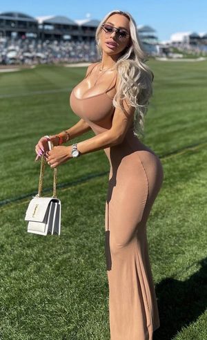 Blonde bimbo in a tight dress
