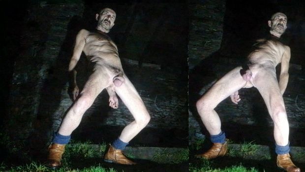 Guy posing nude in public park