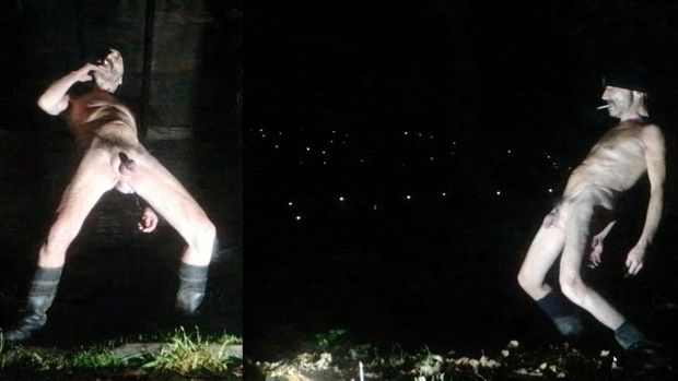 Guy posing nude in public park