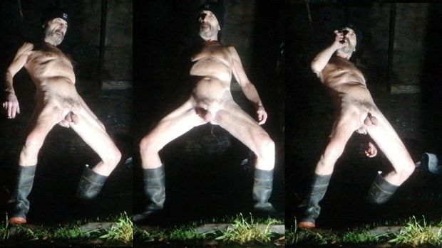 Guy posing naked in public park