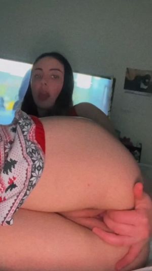 strokes her pretty pussy