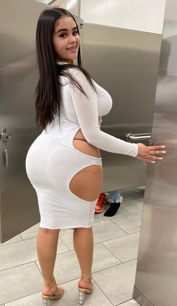 Val white dress in stall showing ass