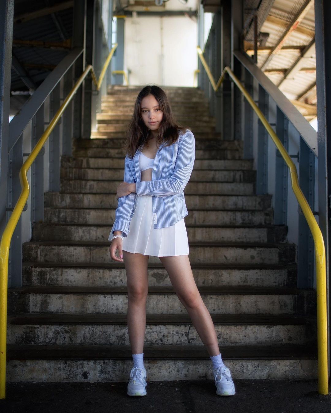 She's getting fucked on those stairs, it's just fact at this point