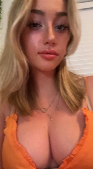 Quincy orange top cleavage