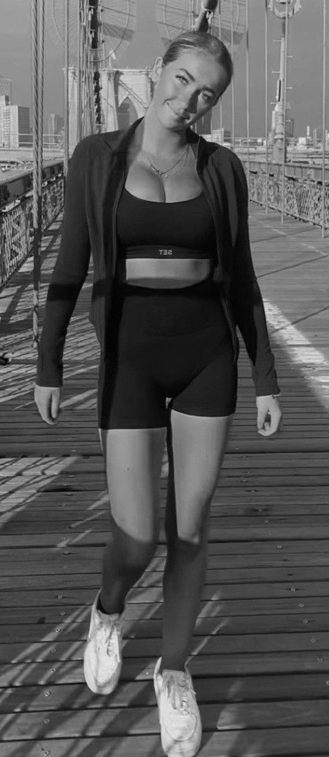 Quincy on bridge black and white